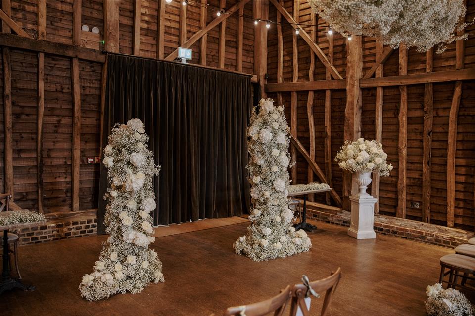 The Barn at Redcoats ceremony set up with floral pillars